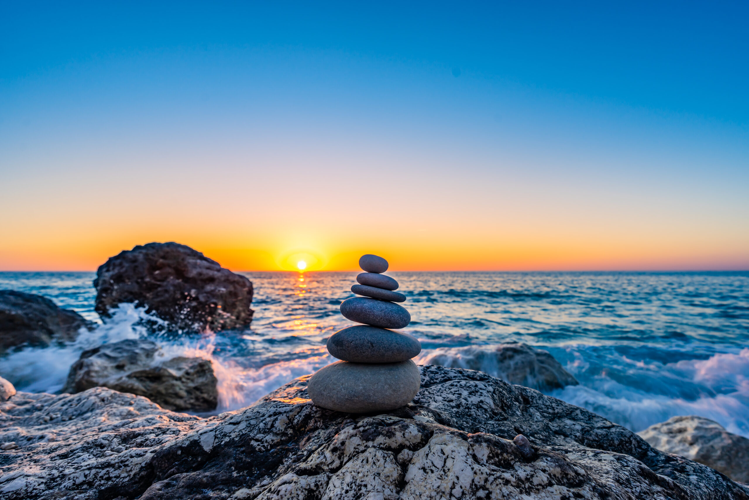 stacked stones at the beach